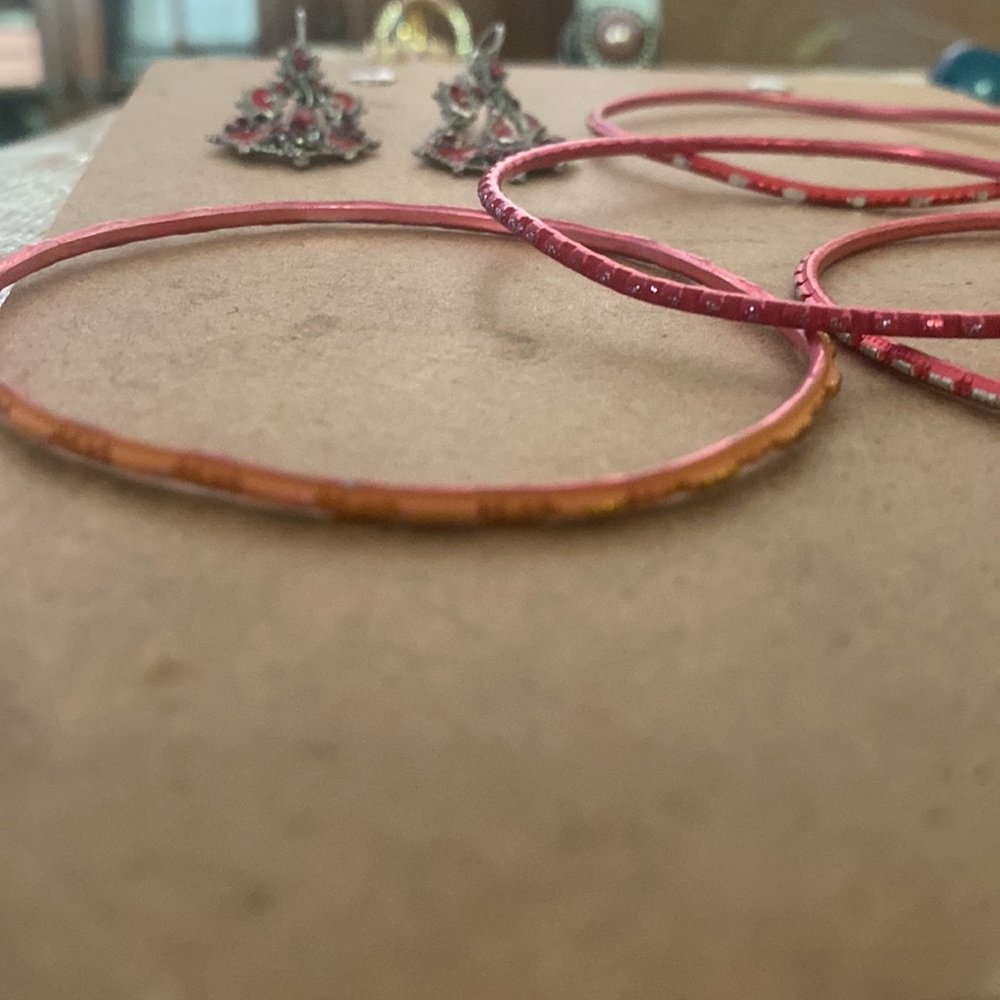 Read Earrings And Four Bangle Bracelets Pretty De… - image 6